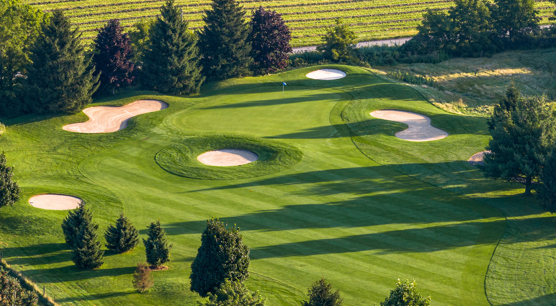 Aerial view of a Peninsula Lakes putting green